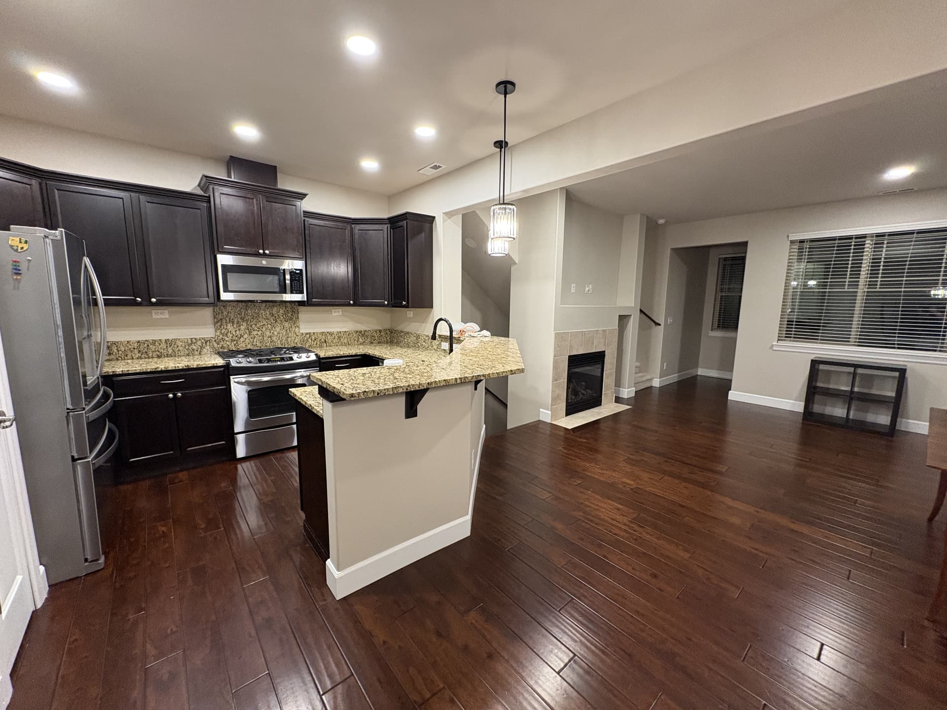 Finished open-plan kitchen and living area after a whole-home remodel in Lynnwood, Washington